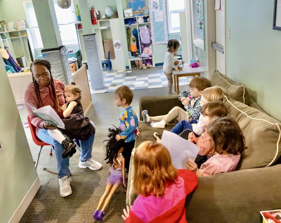 Ashmont Nursery : Reading to the children in school